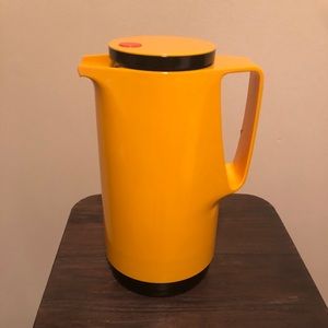 Vintage insulated yellow pitcher